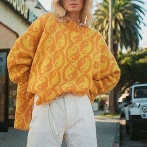 Free People yellow yin yang oversized sweater